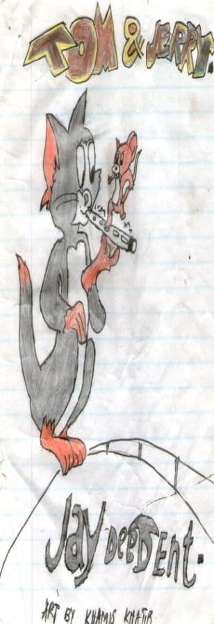 Pupil's pencil drawing of Tom the cat under a Tom and Jerry title on lined paper