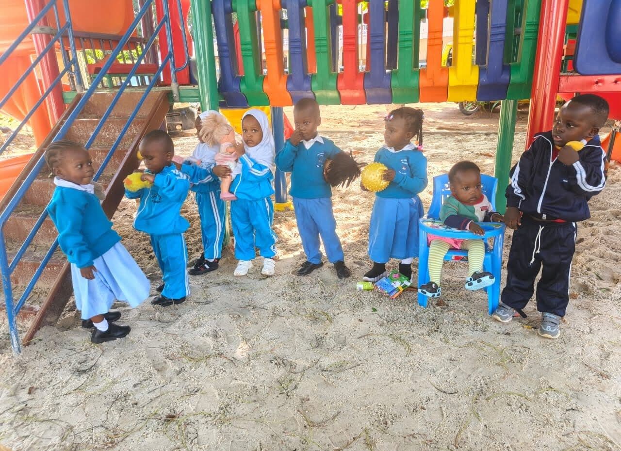Daycare children playing in the sandpit