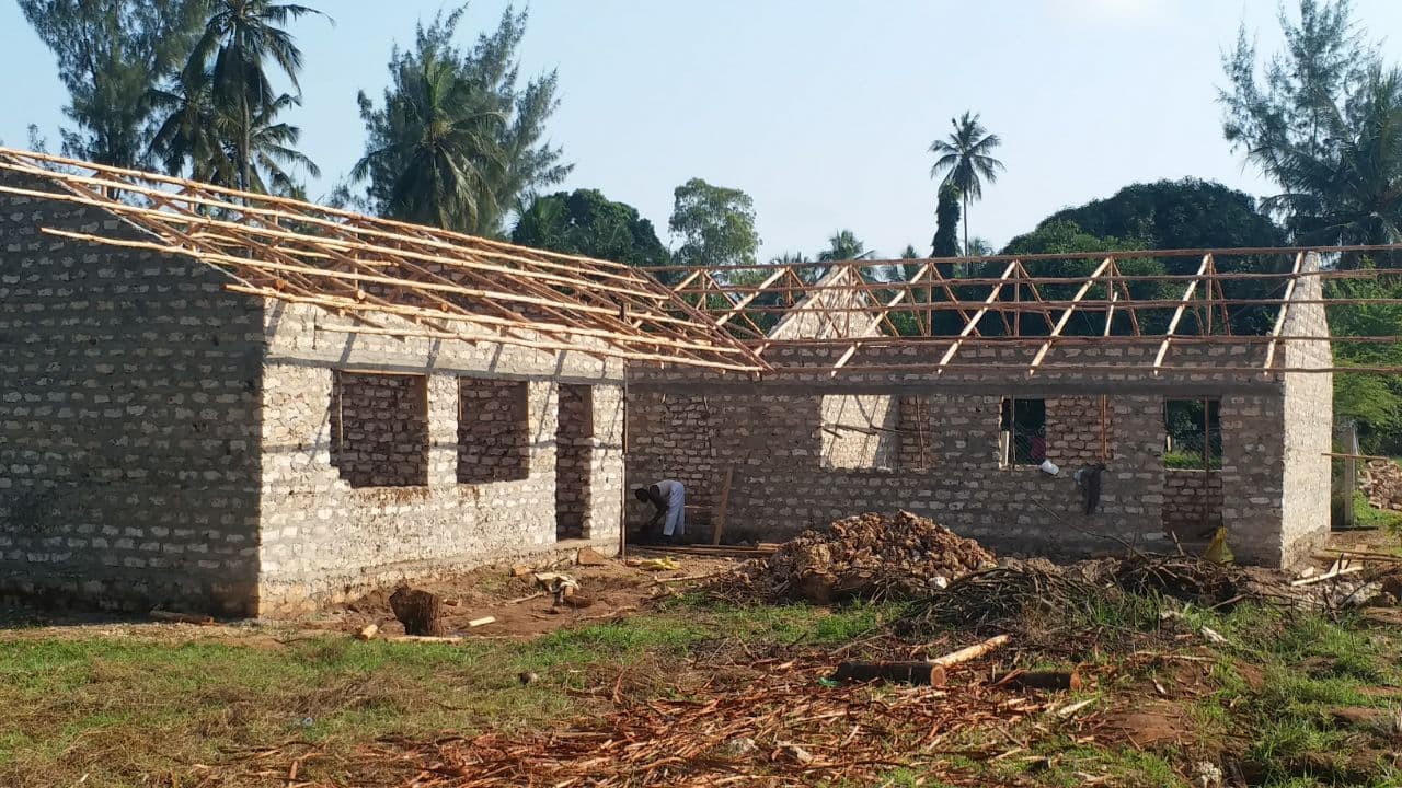 Walls and roof trusses of the new nursery block under construction