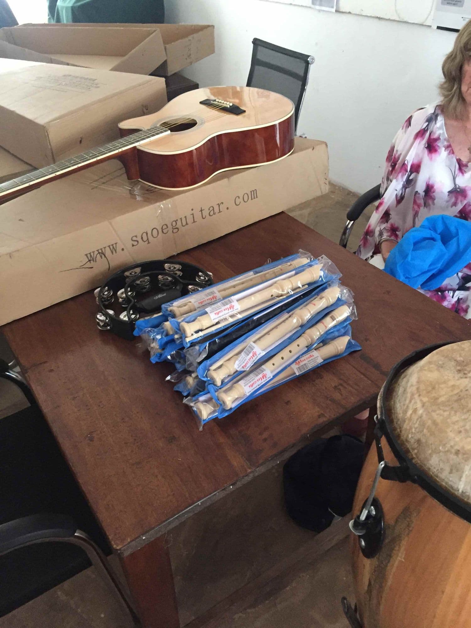 A new guitar, recorders and a drum in a classroom