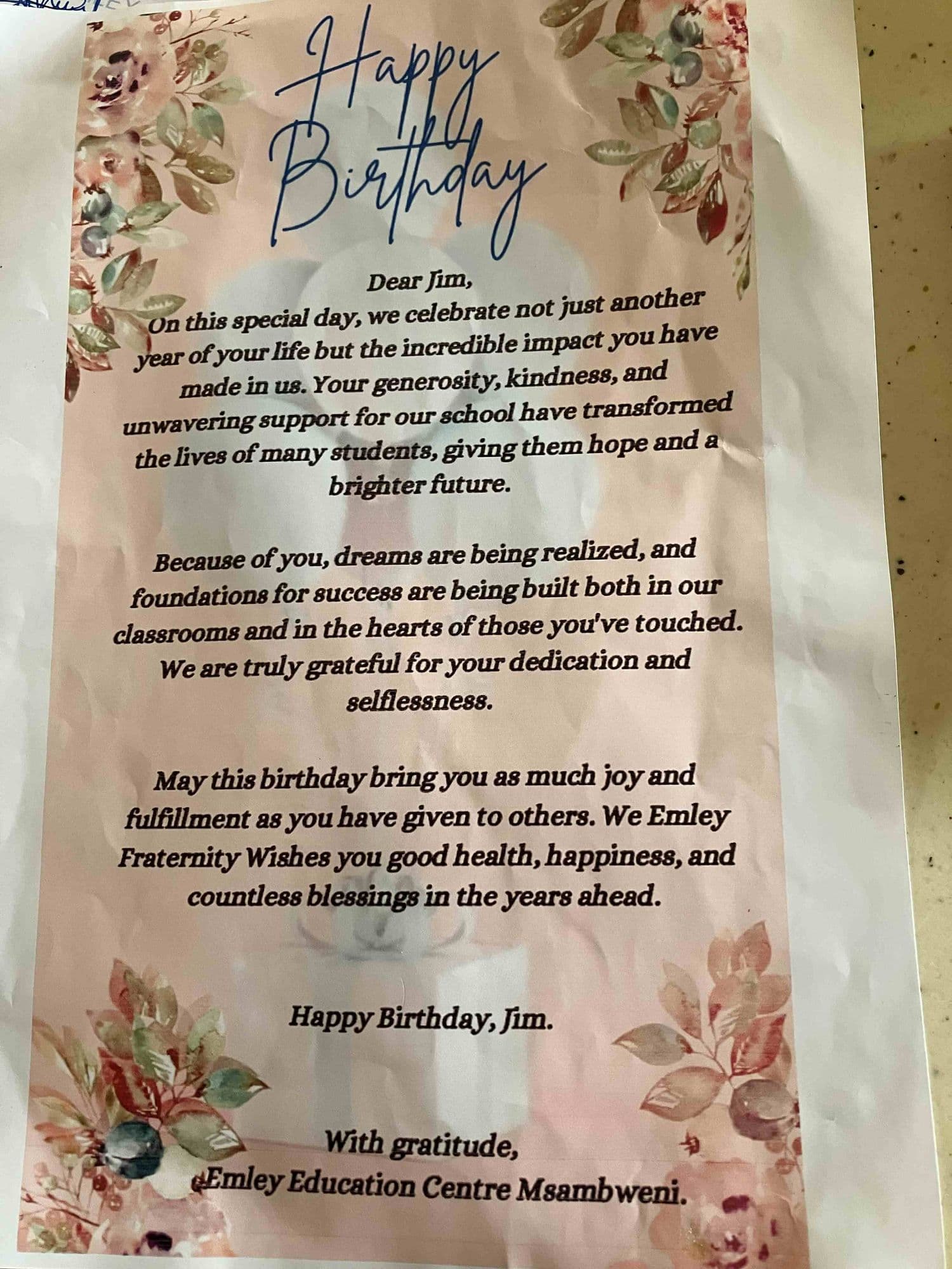 A printed Happy Birthday letter to Jim from Emley Education Centre Msambweni